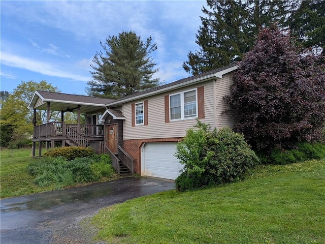 1405 W Main St, Smethport-Borough, PA 16749 - view of front of house featuring driveway, stairway, a front lawn, and an attached garage