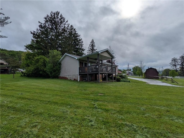1405 W Main St, Smethport-Borough, PA 16749 - view of front of property with a front yard, an outbuilding, a deck, and a barn