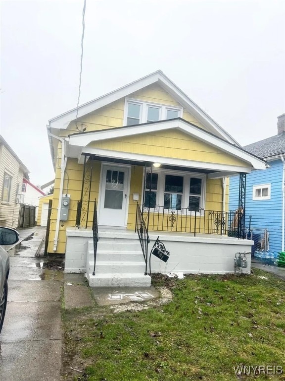 601 Lasalle Ave, Buffalo, NY 14215 - shotgun-style home featuring a porch