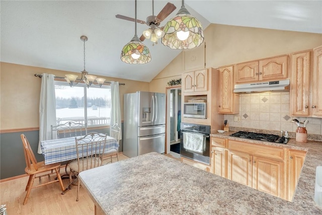 4231 Cauwels Rd, Arcadia, NY 14505 - kitchen featuring appliances with stainless steel finishes, under cabinet range hood, light brown cabinetry, light wood finished floors, and a chandelier