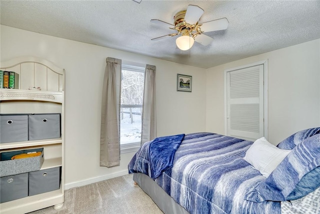 4231 Cauwels Rd, Arcadia, NY 14505 - bedroom featuring carpet, a textured ceiling, baseboards, and a ceiling fan