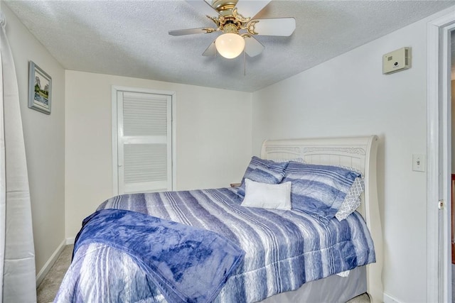 4231 Cauwels Rd, Arcadia, NY 14505 - bedroom with a textured ceiling, carpet flooring, baseboards, and ceiling fan