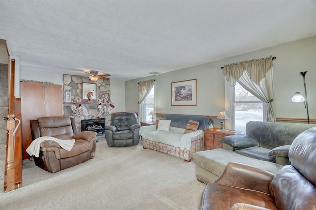 4231 Cauwels Rd, Arcadia, NY 14505 - living area with carpet floors, plenty of natural light, and a ceiling fan
