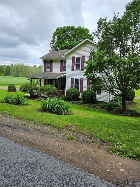 4231 Cauwels Rd, Arcadia, NY 14505 - view of front facade featuring a front lawn