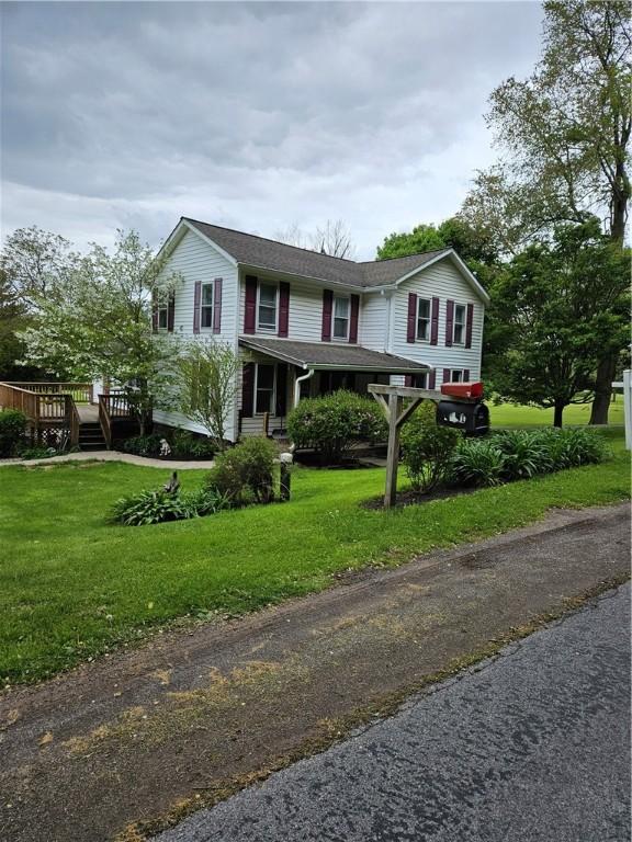 4231 Cauwels Rd, Arcadia, NY 14505 - view of front of property with a front yard