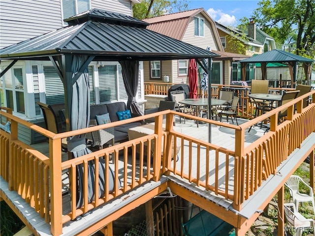 328 Lakeview Blvd, Machias, NY 14042 - wooden deck with a gazebo, outdoor dining space, and outdoor lounge area