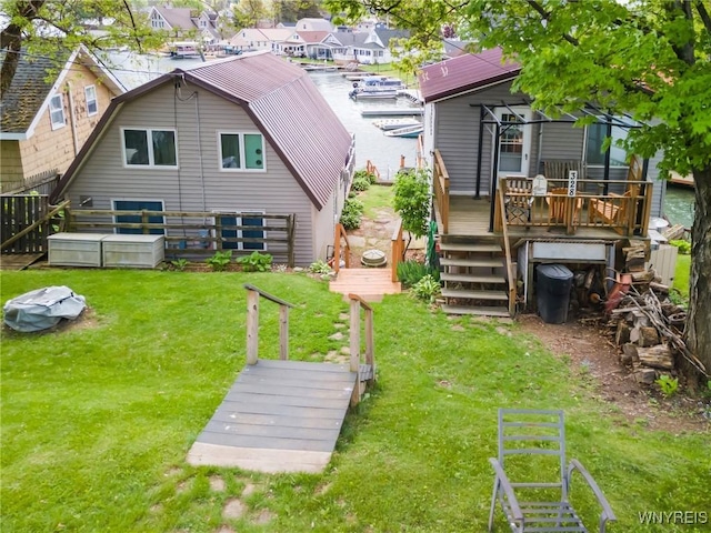 328 Lakeview Blvd, Machias, NY 14042 - back of house featuring a gambrel roof, a wooden deck, a lawn, and a residential view