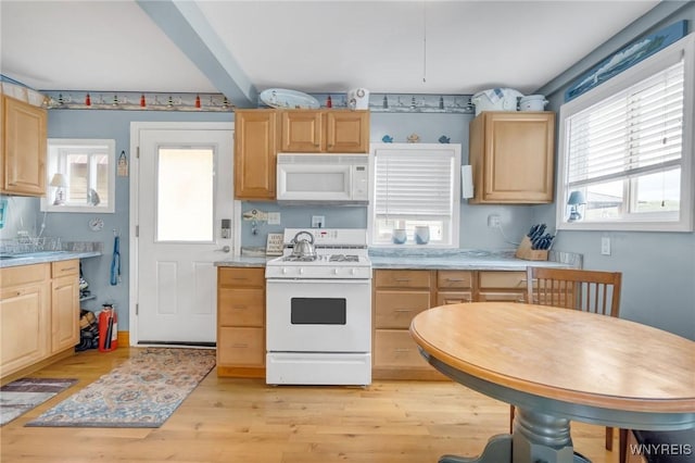 328 Lakeview Blvd, Machias, NY 14042 - kitchen featuring white appliances, light countertops, light brown cabinets, and light wood-type flooring
