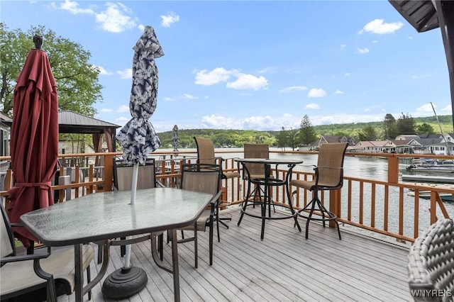 328 Lakeview Blvd, Machias, NY 14042 - deck featuring outdoor dining space, a gazebo, and a water view