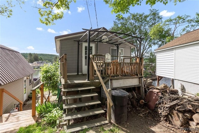 328 Lakeview Blvd, Machias, NY 14042 - rear view of house featuring a wooden deck and stairs
