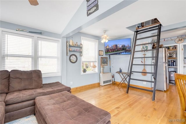 328 Lakeview Blvd, Machias, NY 14042 - living room featuring ceiling fan, light wood-style floors, healthy amount of natural light, lofted ceiling, and baseboards