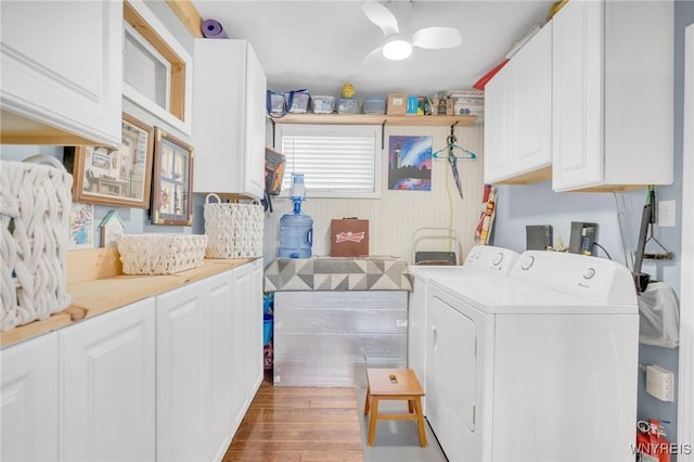 328 Lakeview Blvd, Machias, NY 14042 - laundry room with washing machine and clothes dryer, cabinet space, and wood finished floors