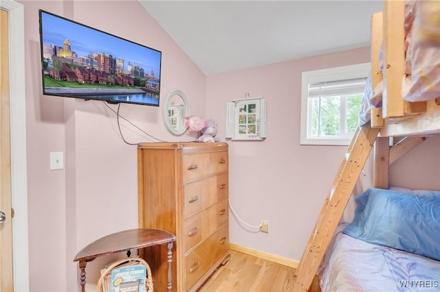 328 Lakeview Blvd, Machias, NY 14042 - bedroom with light wood-style flooring, lofted ceiling, and baseboards