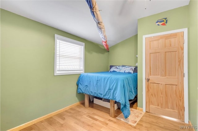 328 Lakeview Blvd, Machias, NY 14042 - bedroom with wood finished floors, baseboards, and lofted ceiling