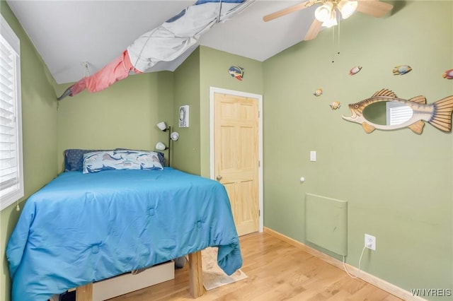 328 Lakeview Blvd, Machias, NY 14042 - bedroom with wood finished floors, multiple windows, ceiling fan, and baseboards