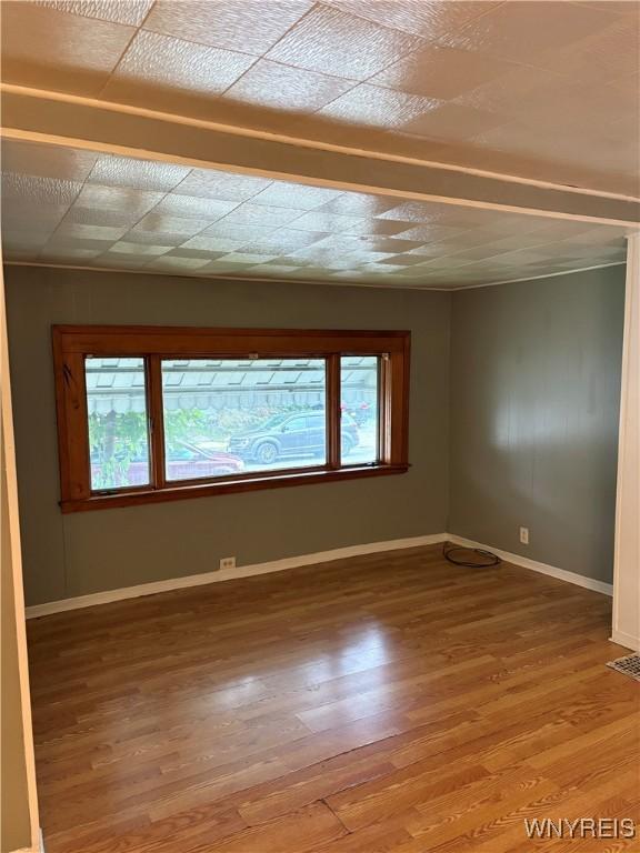68 Decker St, Buffalo, NY 14215 - unfurnished room featuring plenty of natural light and light wood-style floors