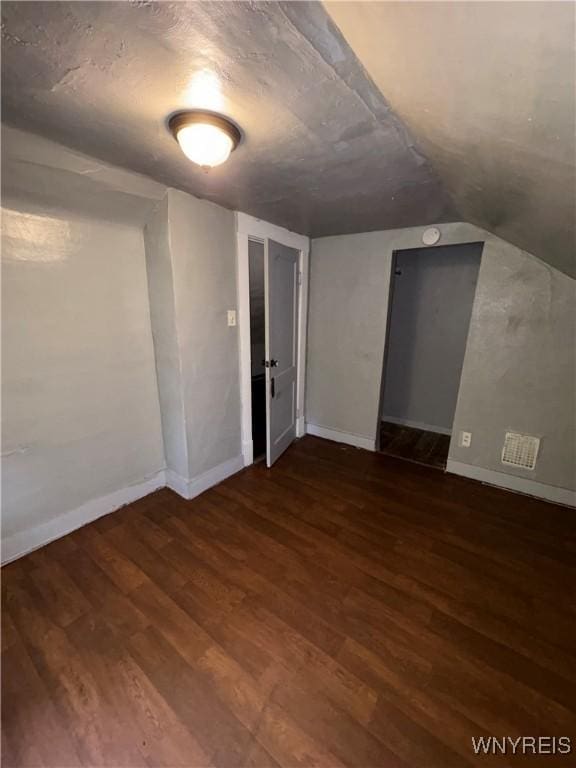 68 Decker St, Buffalo, NY 14215 - additional living space with wood finished floors and vaulted ceiling