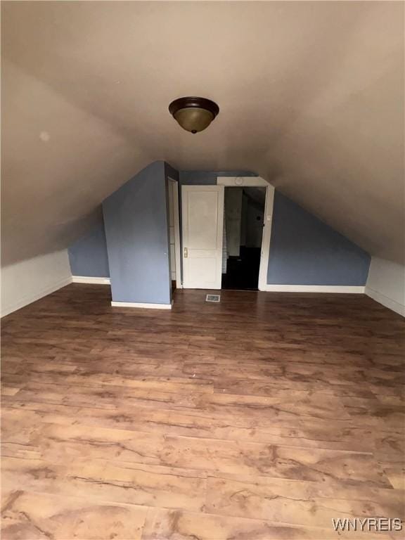 68 Decker St, Buffalo, NY 14215 - additional living space with vaulted ceiling and wood finished floors