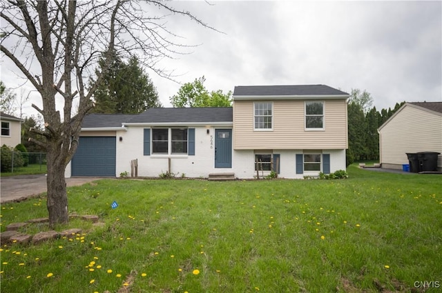 5646 Vistula, Cicero, NY 13029 - tri-level home with a garage, driveway, a front lawn, entry steps, and brick siding