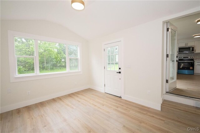 5646 Vistula, Cicero, NY 13029 - entryway featuring wood finished floors, lofted ceiling, and baseboards