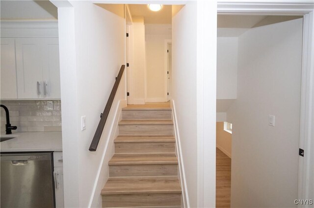 5646 Vistula, Cicero, NY 13029 - stairway featuring wood finished floors and baseboards