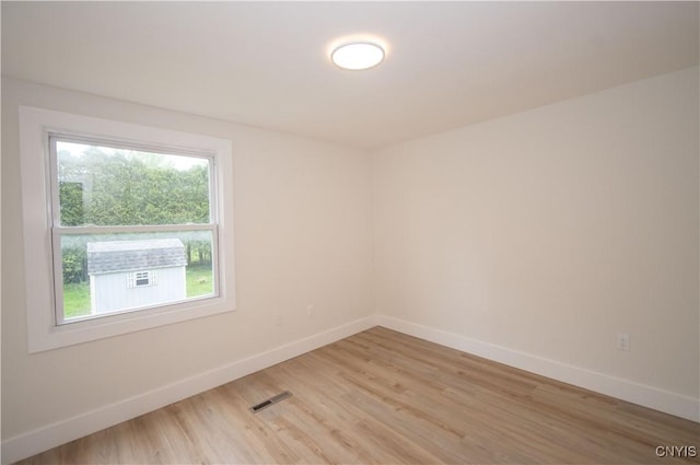 5646 Vistula, Cicero, NY 13029 - spare room featuring baseboards and light wood-type flooring
