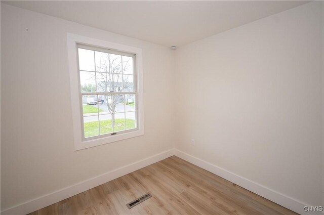 5646 Vistula, Cicero, NY 13029 - spare room with baseboards and light wood-type flooring
