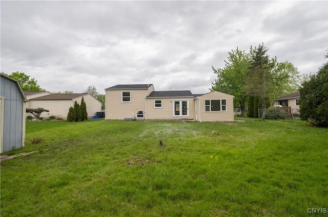 5646 Vistula, Cicero, NY 13029 - rear view of property with a lawn