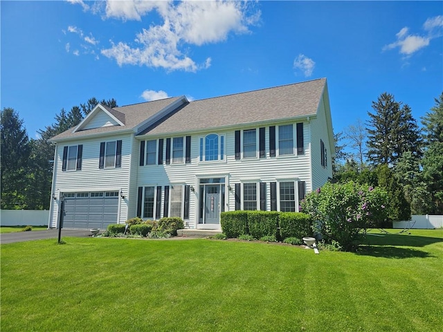 1 Woodsview Dr, Big Flats, NY 14903 - colonial inspired home featuring an attached garage and asphalt driveway