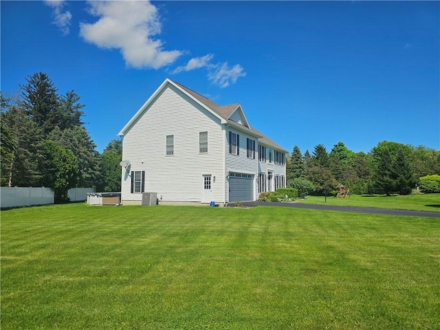 1 Woodsview Dr, Big Flats, NY 14903 - view of property exterior with driveway and a garage