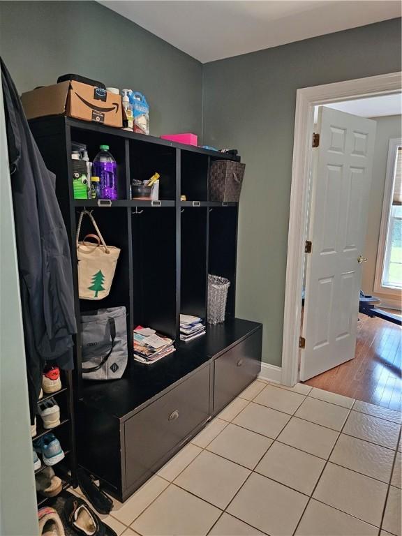 1 Woodsview Dr, Big Flats, NY 14903 - mudroom featuring light tile patterned floors and baseboards