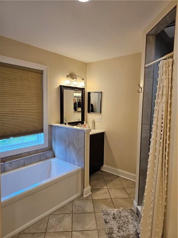 1 Woodsview Dr, Big Flats, NY 14903 - bathroom featuring a garden tub, vanity, tile patterned flooring, curtained shower, and baseboards
