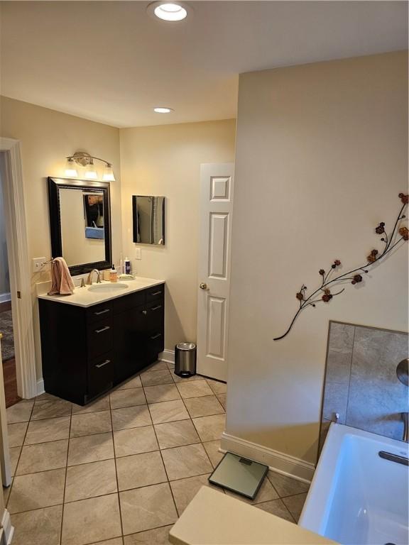 1 Woodsview Dr, Big Flats, NY 14903 - bathroom with tile patterned floors, vanity, baseboards, and recessed lighting