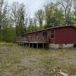 3384 Huggins Rd, Tyrone, NY 14815 - rear view of house with a deck and crawl space