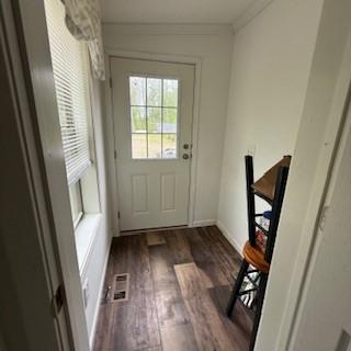 3384 Huggins Rd, Tyrone, NY 14815 - entryway with wood finished floors, crown molding, and baseboards