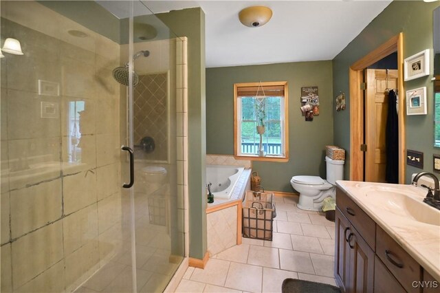161 Mcclure Rd, Salisbury, NY 13470 - bathroom with a garden tub, vanity, tile patterned floors, toilet, and a stall shower