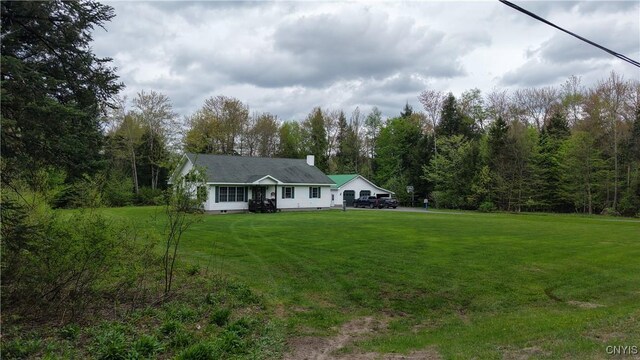 161 Mcclure Rd, Salisbury, NY 13470 - ranch-style home featuring a front lawn and a wooded view