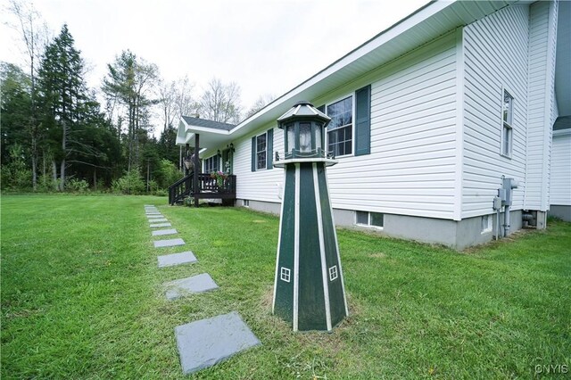 161 Mcclure Rd, Salisbury, NY 13470 - view of home's exterior featuring a lawn