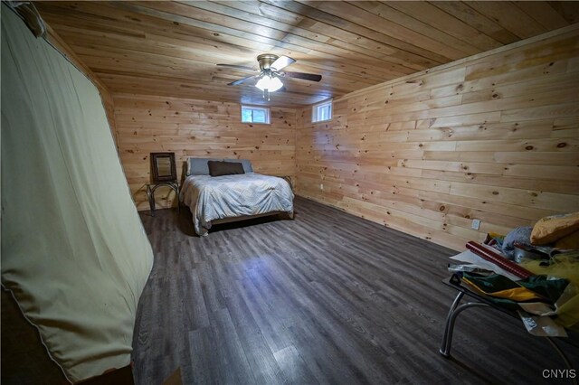 161 Mcclure Rd, Salisbury, NY 13470 - bedroom with wooden ceiling, wooden walls, wood finished floors, and ceiling fan