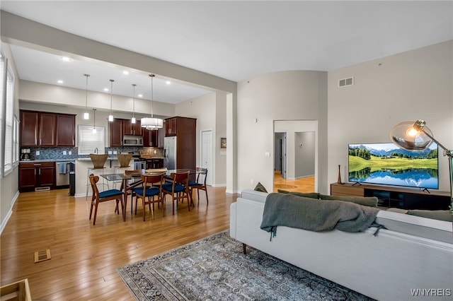 185 York St Unit 1, Buffalo, NY 14213 - living room featuring light wood-style floors and recessed lighting