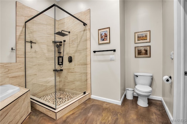 185 York St Unit 1, Buffalo, NY 14213 - full bathroom with a stall shower, baseboards, toilet, and a garden tub