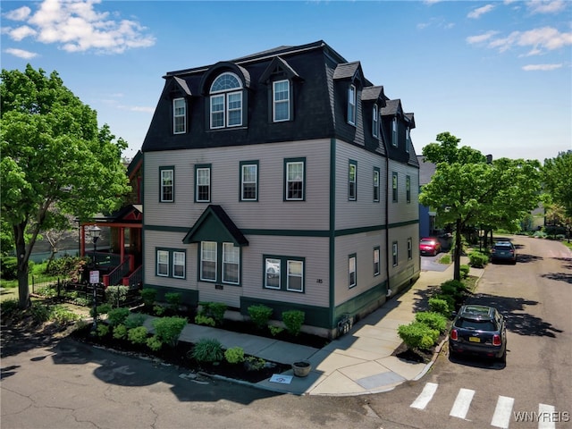 185 York St Unit 1, Buffalo, NY 14213 - view of front of house featuring mansard roof and roof with shingles