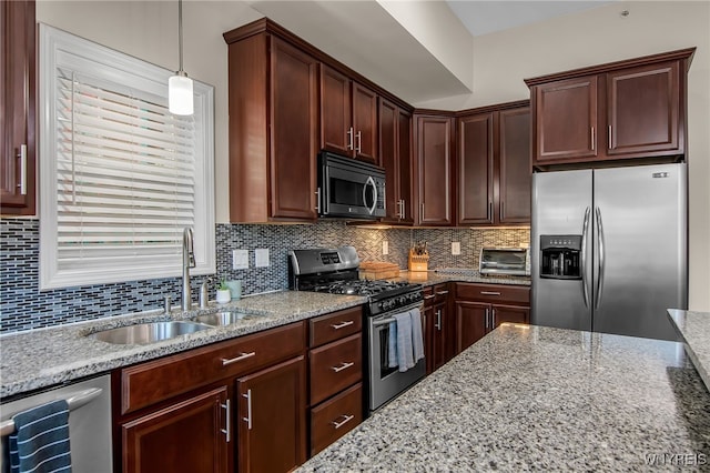 185 York St Unit 1, Buffalo, NY 14213 - kitchen with appliances with stainless steel finishes, a sink, light stone counters, and tasteful backsplash