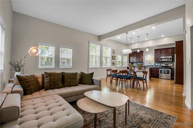 185 York St Unit 1, Buffalo, NY 14213 - living room featuring light wood-type flooring, recessed lighting, and baseboards