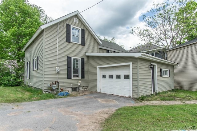 71 Champion St, Champion, NY 13619 - view of property exterior with a garage and asphalt driveway