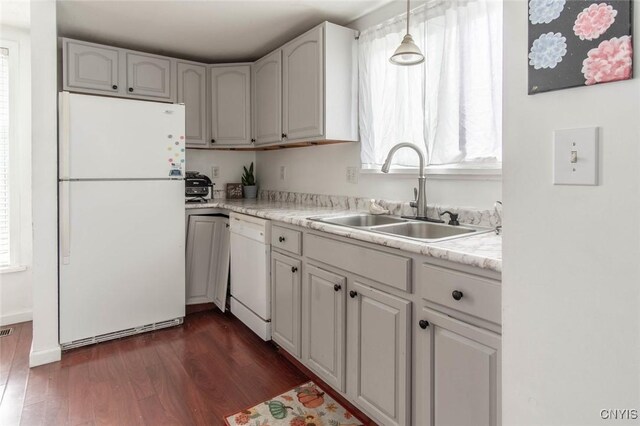 71 Champion St, Champion, NY 13619 - kitchen featuring white appliances, a sink, dark wood-style flooring, and plenty of natural light