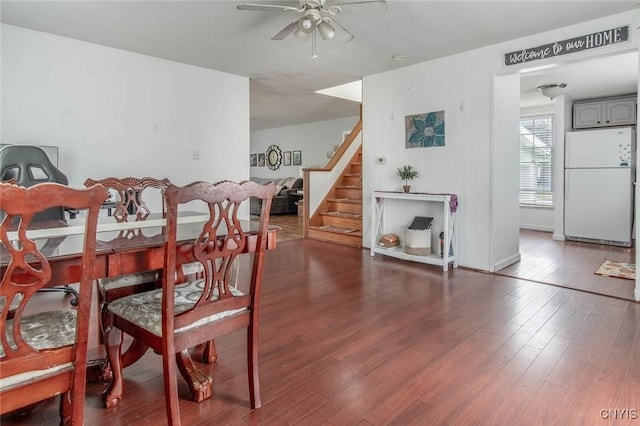 71 Champion St, Champion, NY 13619 - dining room with a ceiling fan, stairs, and wood finished floors