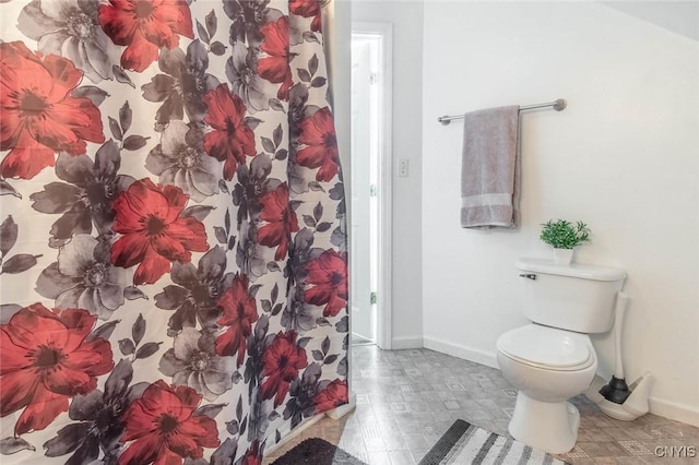 71 Champion St, Champion, NY 13619 - bathroom featuring baseboards, toilet, and curtained shower