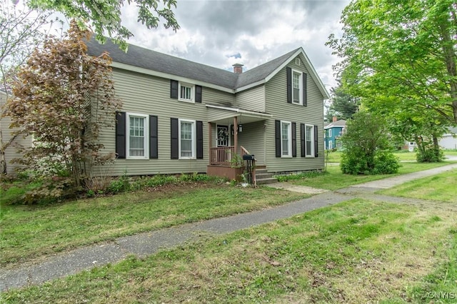 71 Champion St, Champion, NY 13619 - view of front of property with a front yard and a chimney
