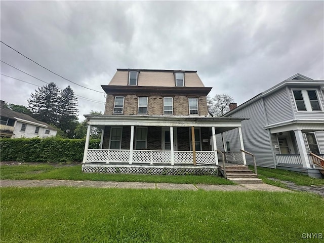 1142 Brinckerhoff Ave, Utica, NY 13501 - view of front of house with brick siding, a porch, and a front lawn